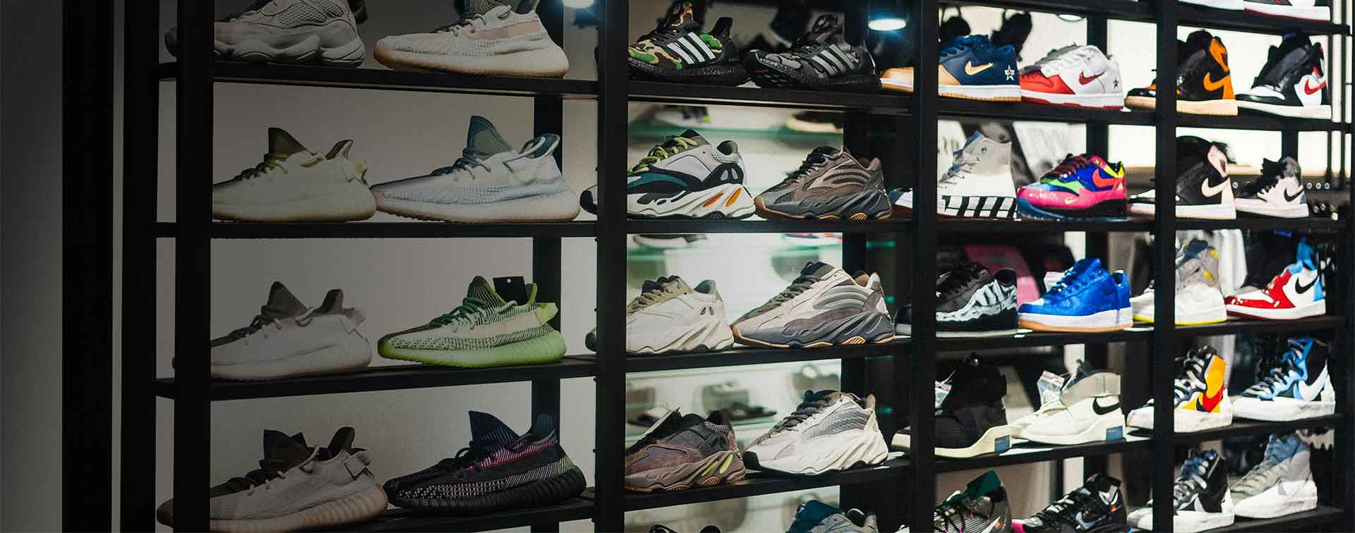 A wall of sneakers collected for reuse and recycling