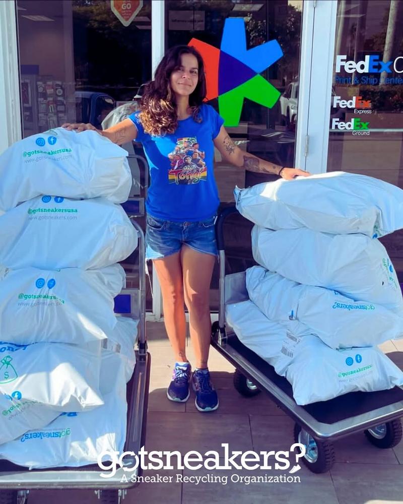 Dropping off bags at FedEx with two carts